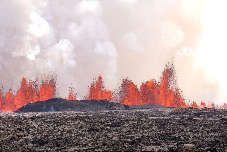 Iceland volcano dramatically erupts again as streams of lava reach town’s defensive walls